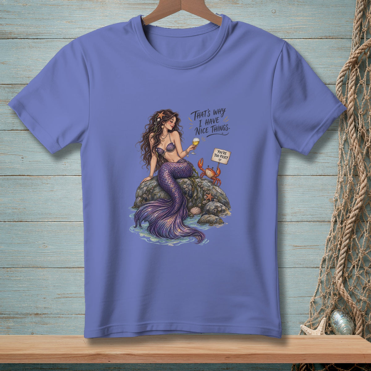 Purple t-shirt graphic of a mermaid with text "That's why I have nice things."