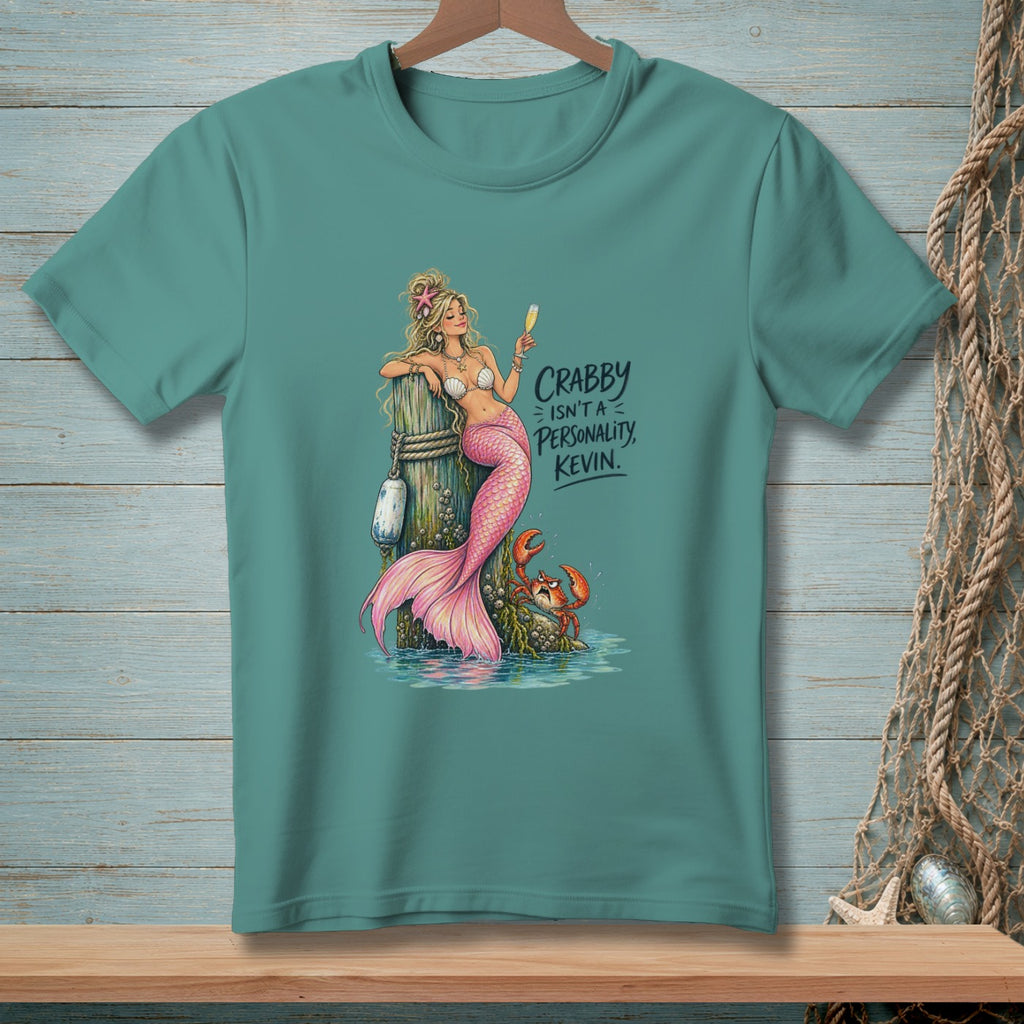 Mermaid with pink tail holding champagne, text "Crabby Isn't a Personality, Kevin."