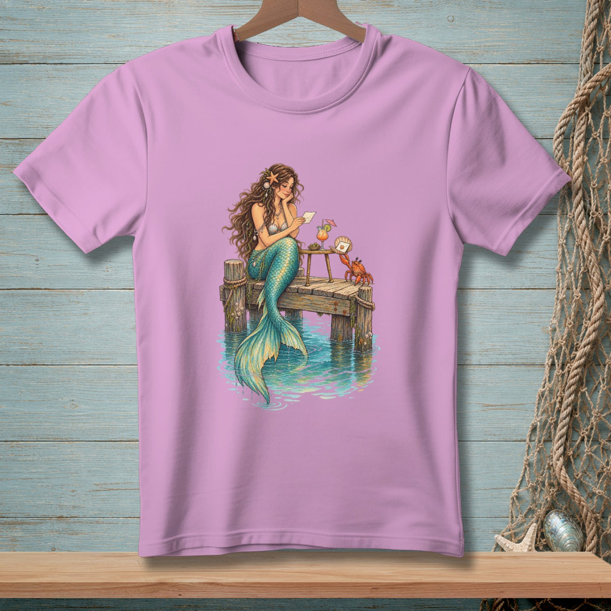 Illustration of a mermaid reading a letter on a pier with a crab and drink.