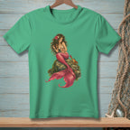 Green t-shirt with a detailed illustration of a mermaid and a crab on a rock.