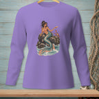 Purple long-sleeve shirt with mermaid, crab, and ocean graphic on a rock.