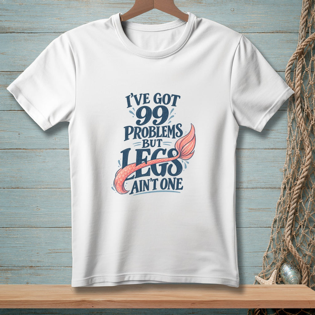 White t-shirt with text "I've got 99 problems but legs ain't one" and a mermaid tail.