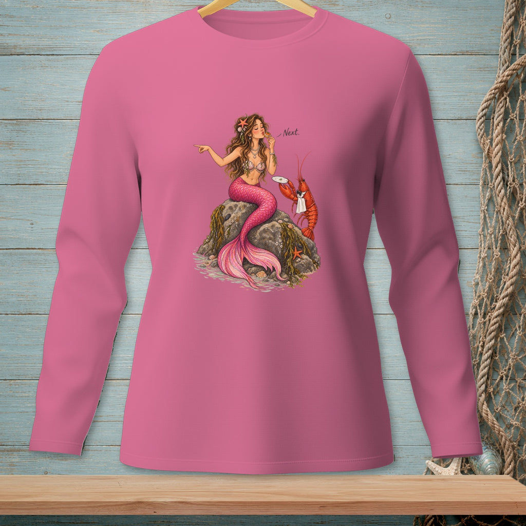 Pink long-sleeve shirt featuring a mermaid and lobster illustration with the text "Next."