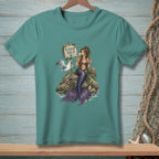 Mermaid and seagull sit on a rock by a "Please Hold" sign, drinking wine.