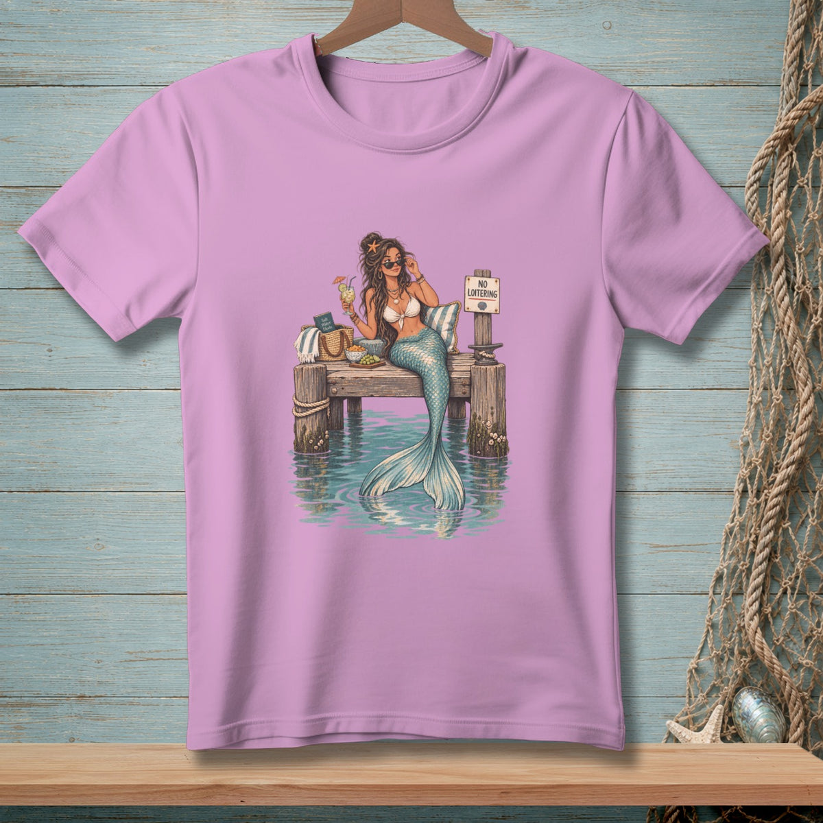 Mermaid with sunglasses and drink on a dock with "No Loitering" sign.