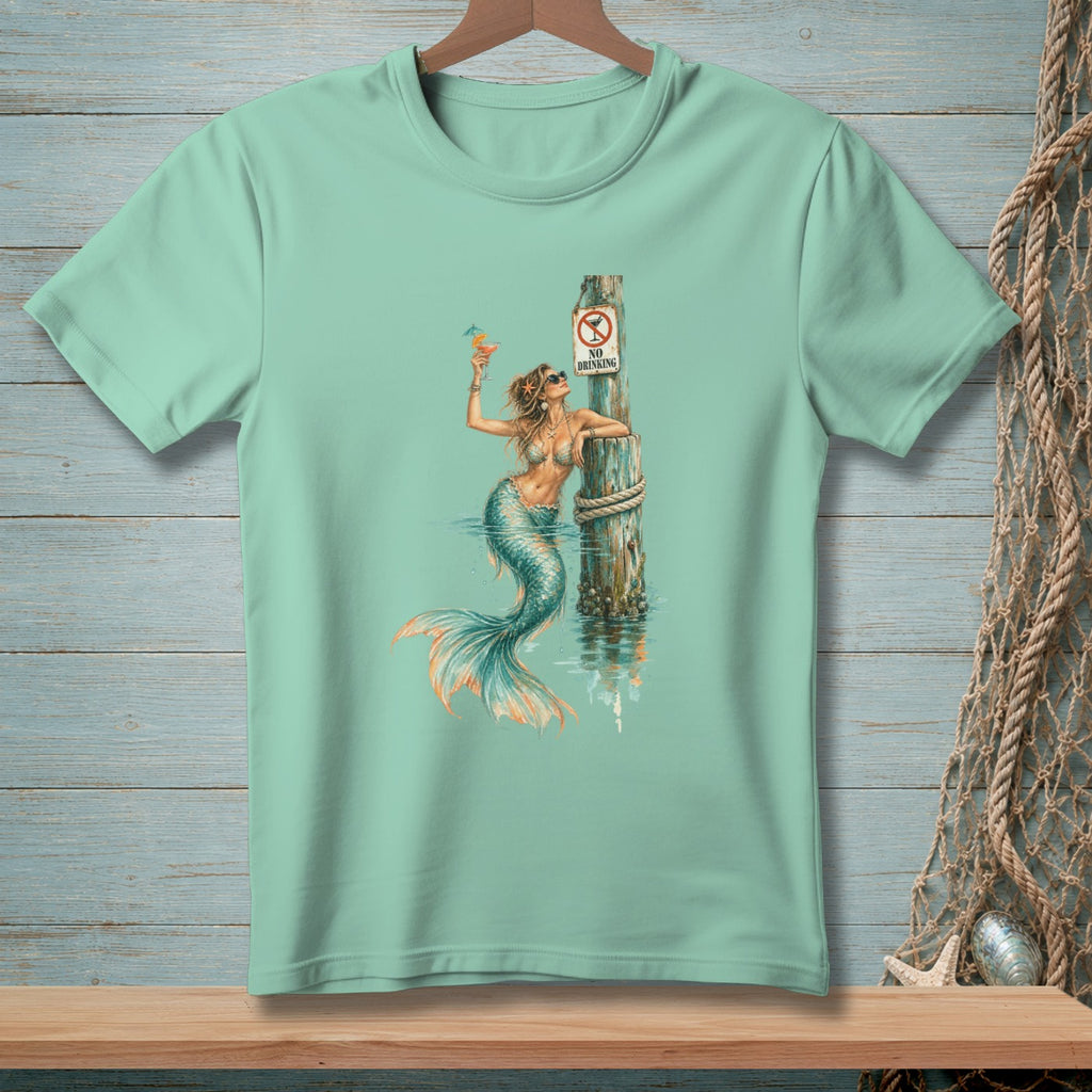 Mermaid with cocktail and "No Drinking" sign on pier post.