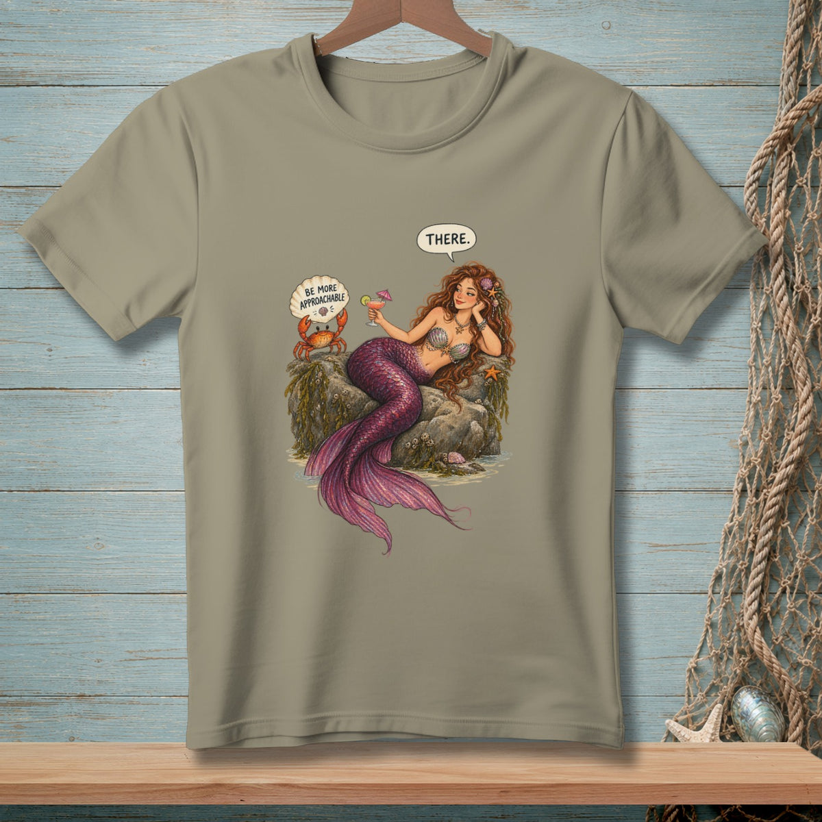 Mermaid with cocktail and crab saying "Be More Approachable" and "There."