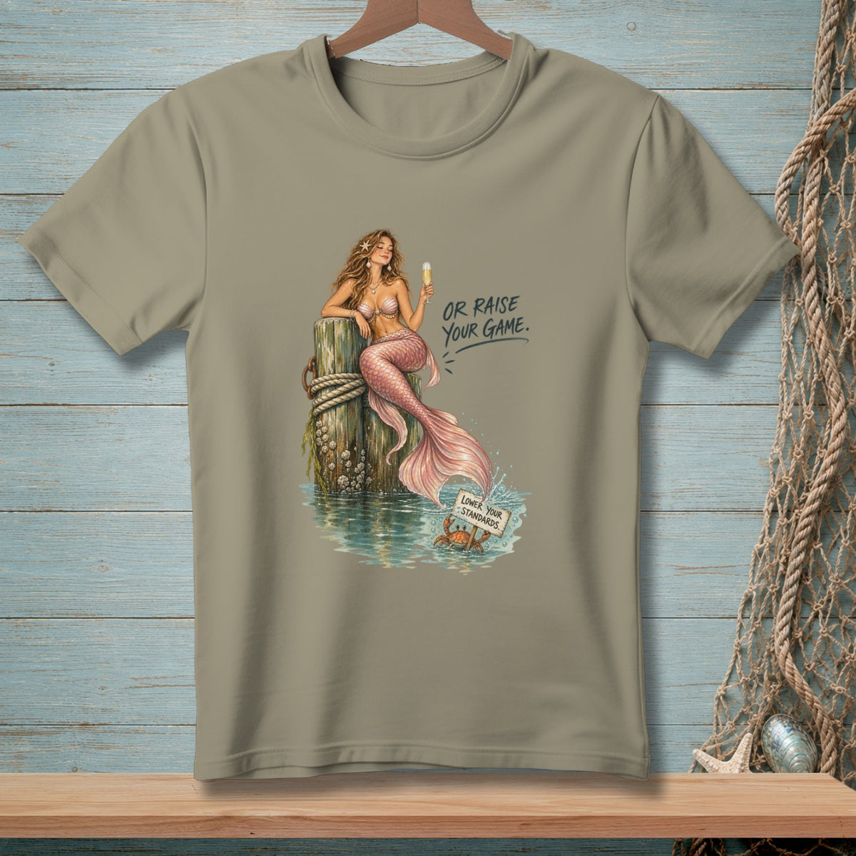 Mermaid by a post with text "Or Raise Your Game" and crab with sign.