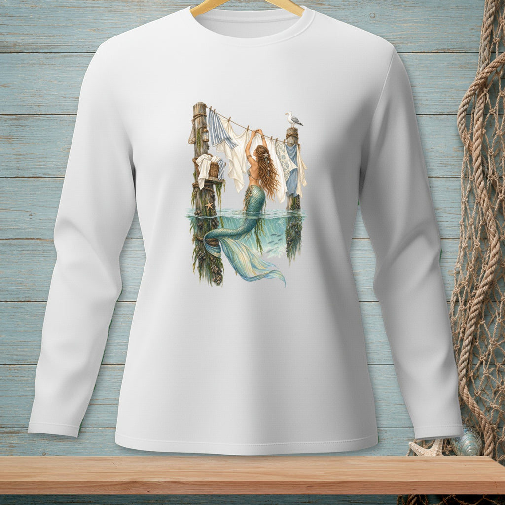 Mermaid hanging laundry on a clothesline by wooden posts and a seagull.