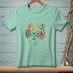 Mermaid with octopus, holding flowers and sunglasses, on mint green t-shirt.