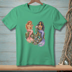 Two mermaids sit on rocks surrounded by treasures and trash.