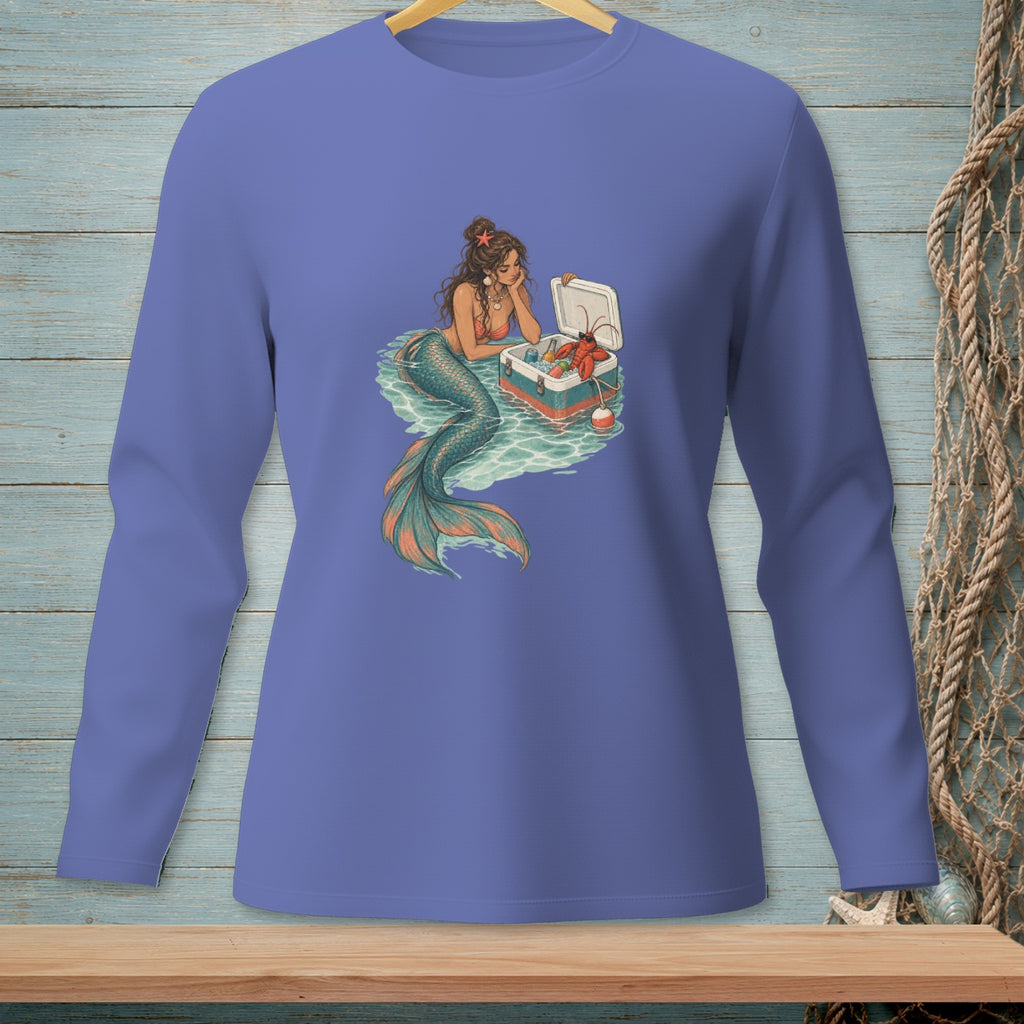 Mermaid by cooler with lobster and drinks in ocean waves.