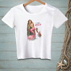 White t-shirt with mermaid illustration and text "I SAID IMPRESS ME."
