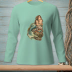 Mint green long-sleeved shirt with a graphic of a mermaid sitting on rocks.
