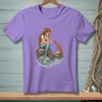 Purple t-shirt with illustration of a mermaid and lobster on rocks.