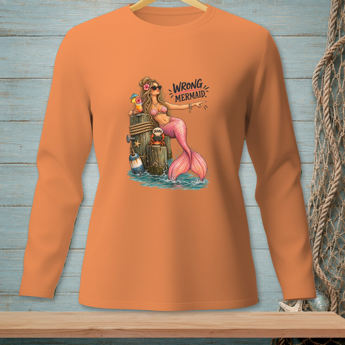 Long-sleeve orange shirt with a mermaid graphic that reads "Wrong Mermaid".