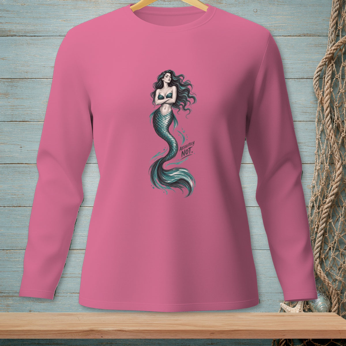 Pink long-sleeve shirt with a mermaid graphic and "ABSOLUTELY NOT." text.