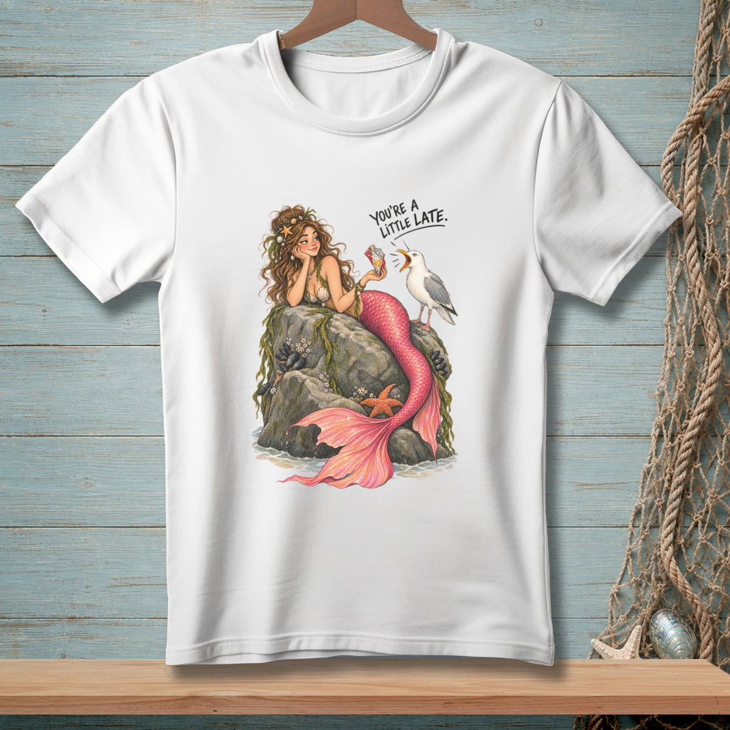 White t-shirt with a mermaid and seagull graphic that reads "You're a little late."