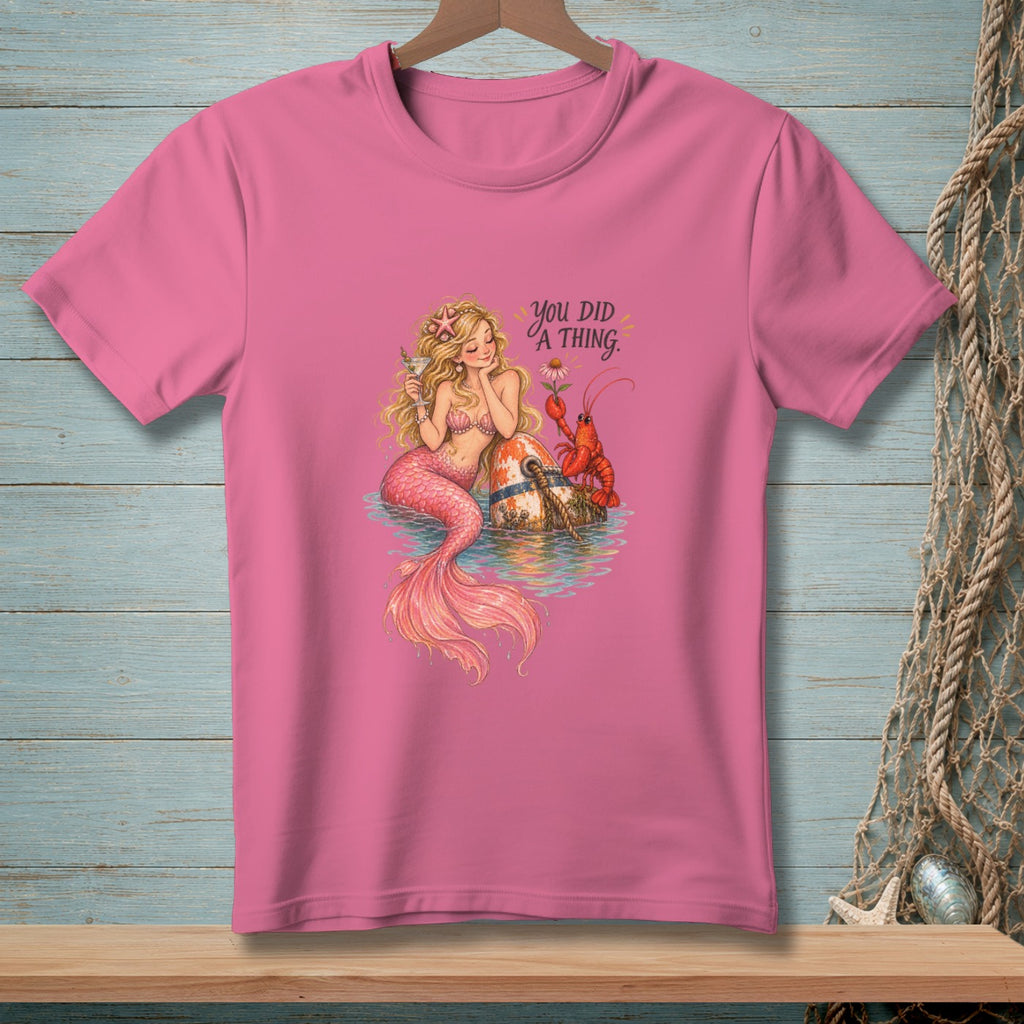 Pink t-shirt with a mermaid, lobster, and text "YOU DID A THING."