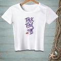 White t-shirt with purple text "Talk to the Tail" and a mermaid tail graphic.