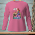 Pink long-sleeve shirt with a mermaid and crab on a dock.