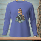 Long-sleeve shirt with a mermaid holding a seashell on a rock surrounded by water.