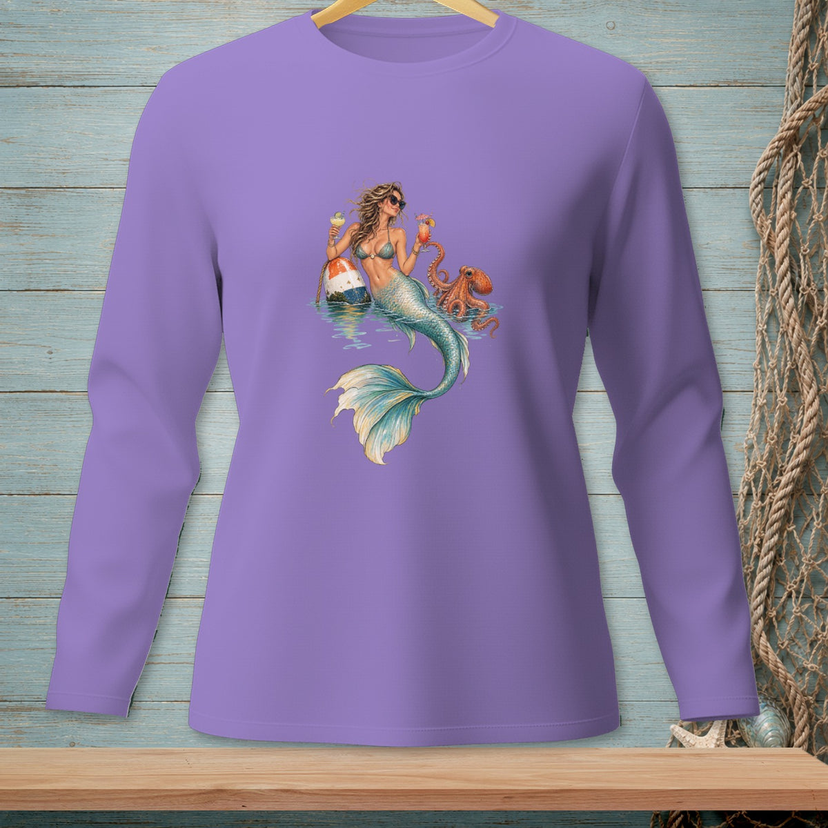 Purple long-sleeve shirt with mermaid, octopus, buoy, and cocktails graphic.
