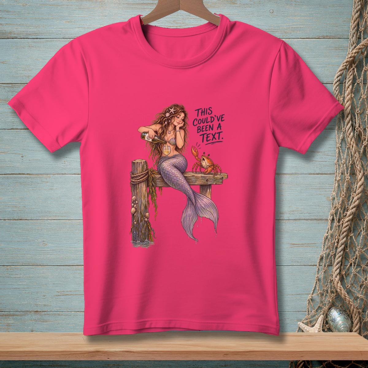 Mermaid pouring wine with a crab on a pier, text says "This could've been a text."