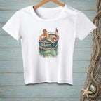 White t-shirt with mermaid on a boat graphic, reading "Whatever Floats Your Boat."