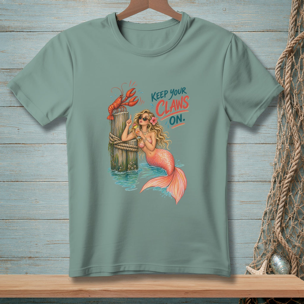 Mermaid with lobster on post, drinking cocktail, text "Keep Your Claws On".