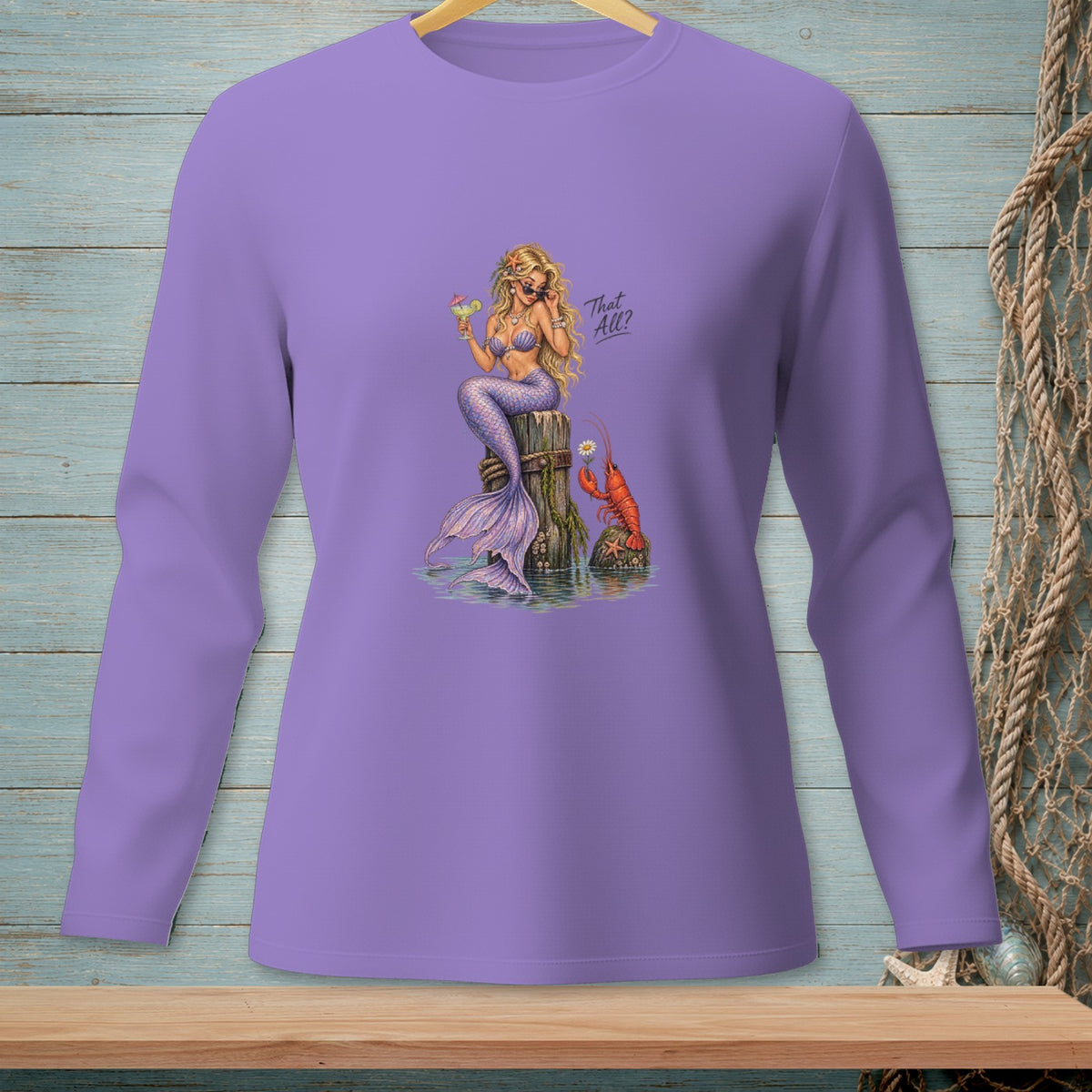 Purple long-sleeve shirt with a mermaid, lobster, and text "That All?".