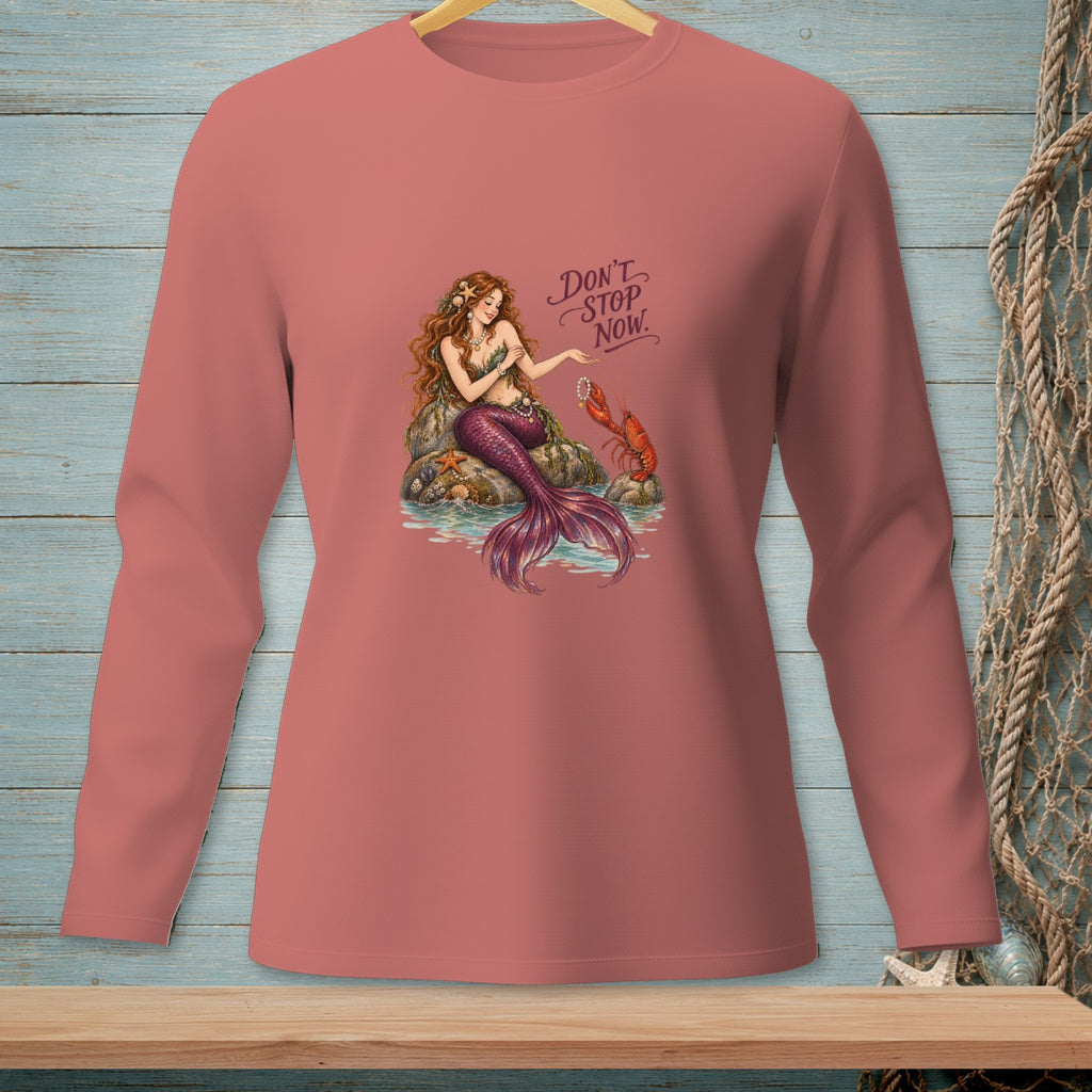 Mermaid and lobster graphic with "Don't Stop Now" text on a pink long-sleeve shirt.