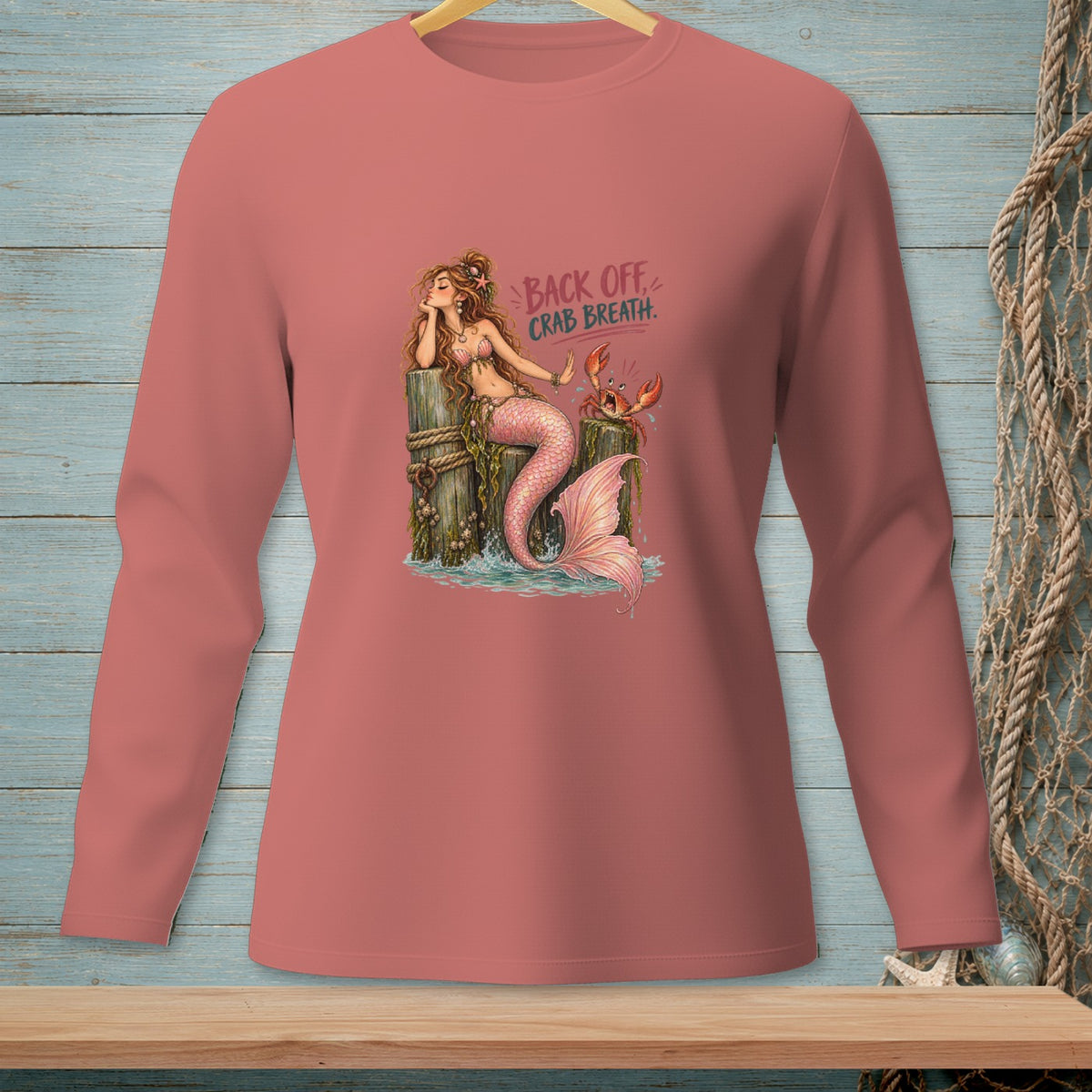 Mermaid sitting on a dock with a crab and text "BACK OFF CRAB BREATH."