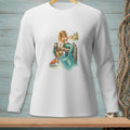 White long-sleeve shirt with a graphic of a mermaid and crab on a pier.