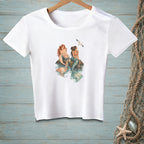 White t-shirt with graphic of two mermaids on rocks with a seagull overhead.