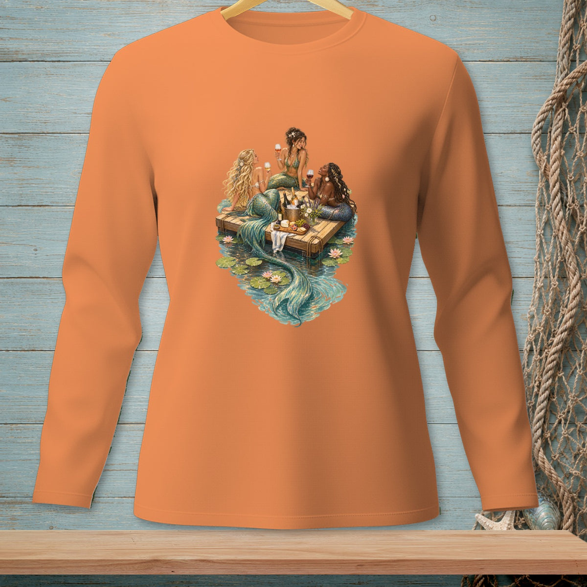 Mermaids relaxing on a raft with drinks and snacks surrounded by water lilies.