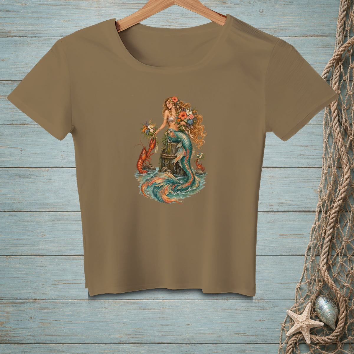 T-shirt with mermaid holding flowers, next to a lobster and a crab.