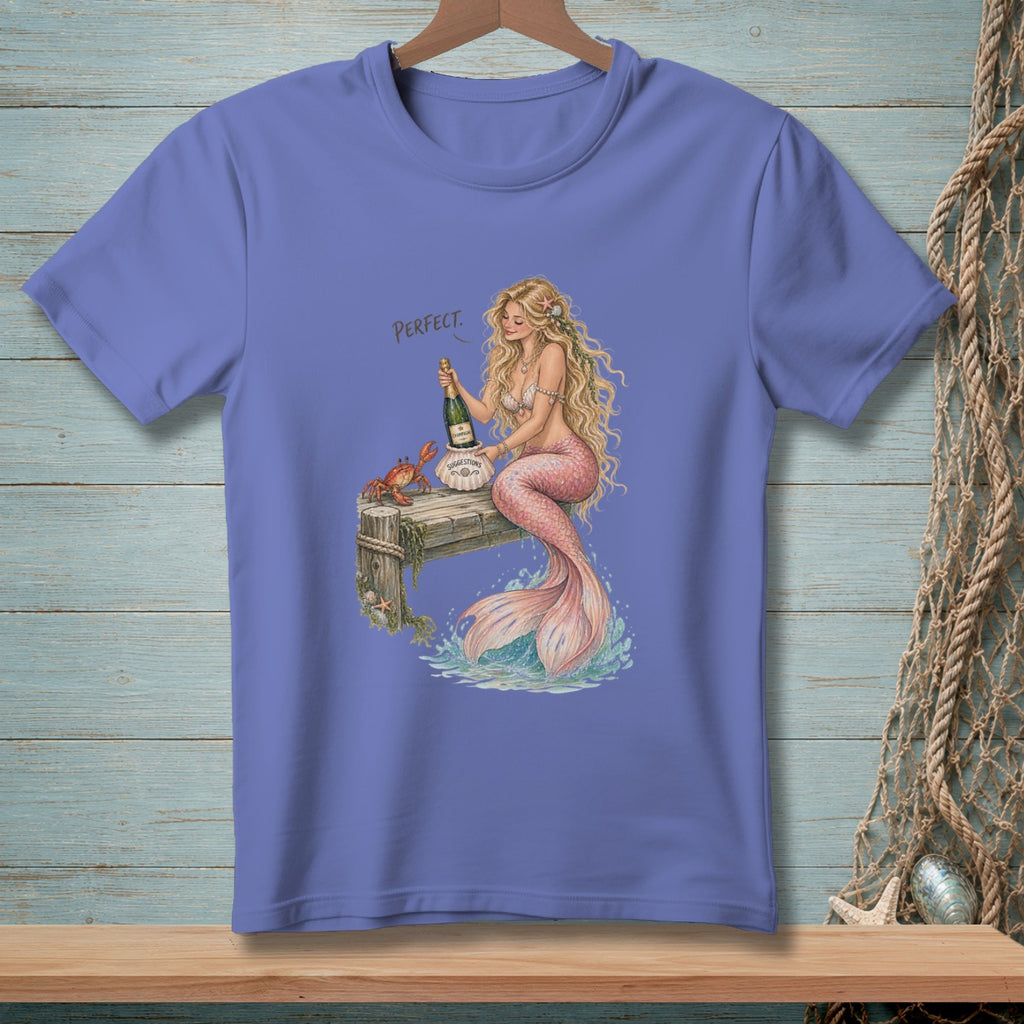 Mermaid with champagne and crab on a dock, saying "PERFECT."
