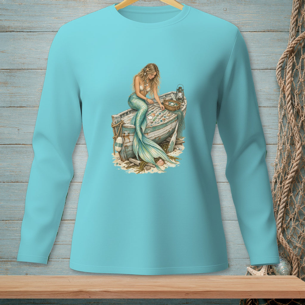Mermaid sitting on a boat filled with seashells and a basket of treasures.