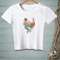 T-shirt with graphic of mermaid, octopus, lighthouse, and seagull in water.
