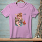 Mermaid with pink tail sits on a dock with a lobster and text "You Forgot Something."