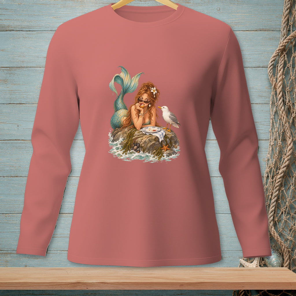Long-sleeve coral shirt with a mermaid and seagull on a rock design.