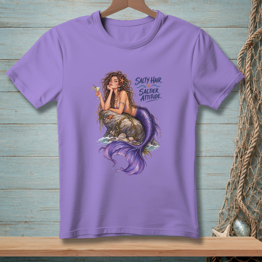 Purple t-shirt with illustration of a mermaid on a rock with text "Salty Hair. Saltier Attitude."