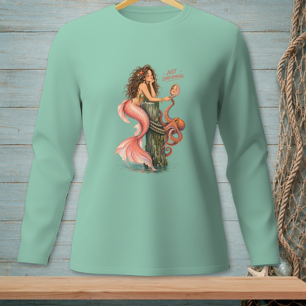 Mermaid looking in a mirror with text "Just Confirming" and an octopus.