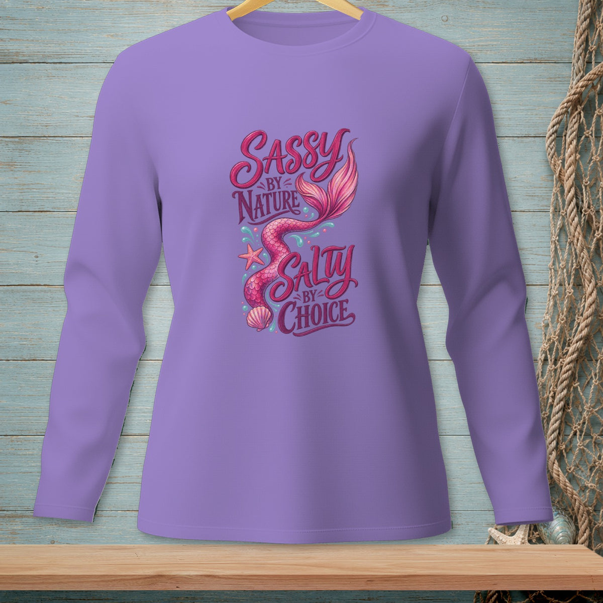 Purple long sleeve shirt with mermaid tail and text Sassy by Nature Salty by Choice.