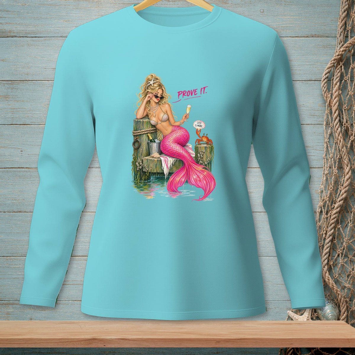 Mermaid with pink tail and champagne says "Prove it." Crab says "Less is more."