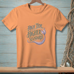 Peach t-shirt with "High Tide Higher Standards" text and mermaid tail graphic.