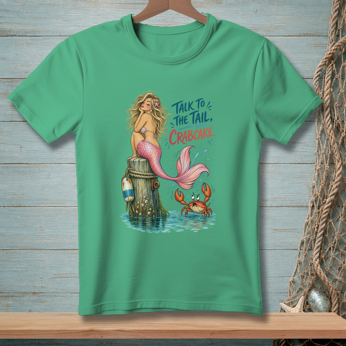 Mermaid and crab graphic with text "Talk to the tail, crabcake."