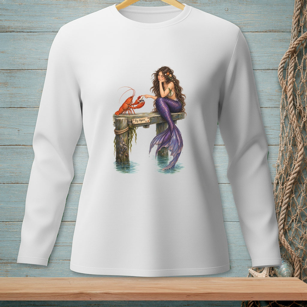 Mermaid sitting on dock next to lobster, with text "Try Again".