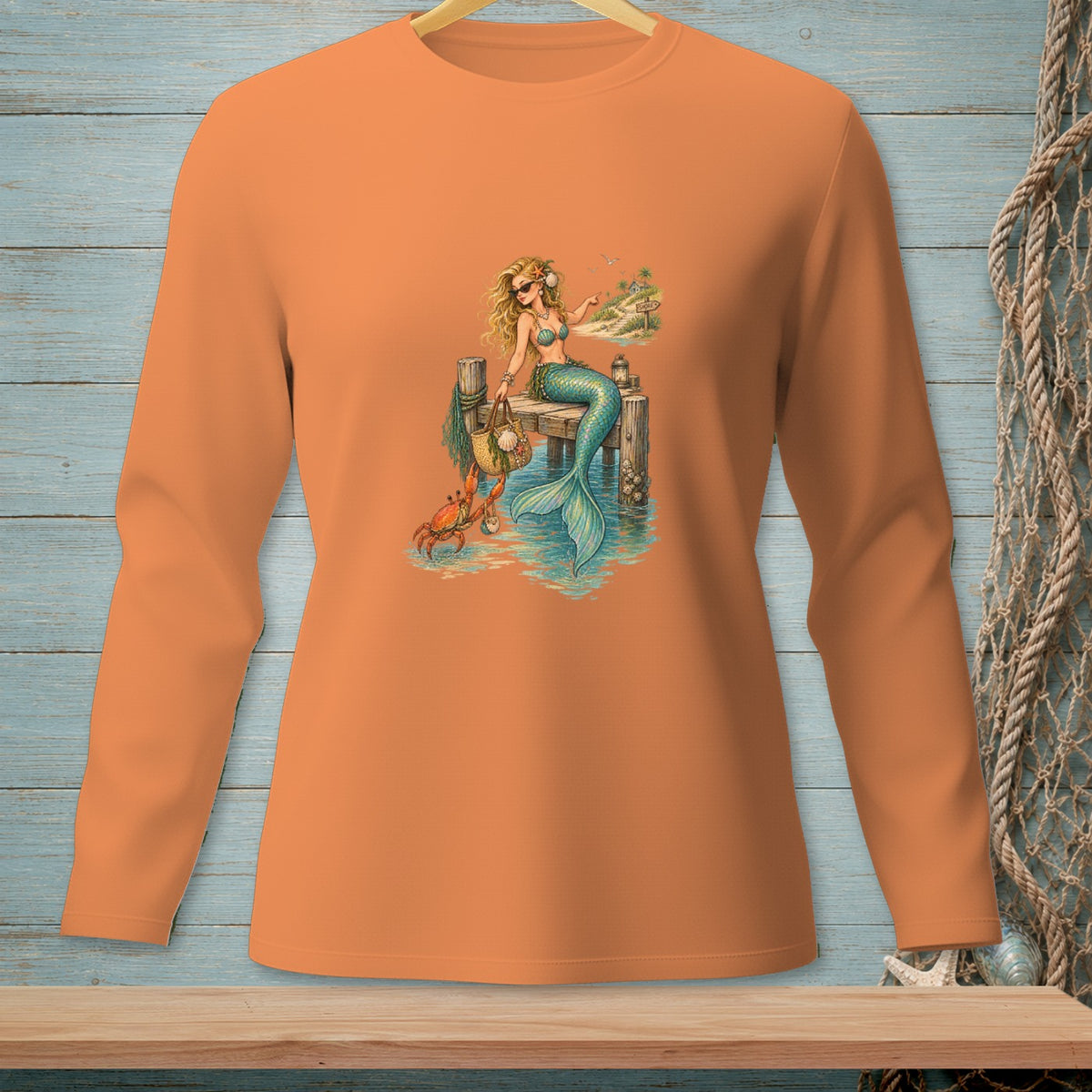 Mermaid and crab on a pier with a tropical island in the background.